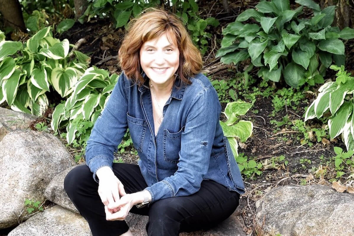 Photo of Dr. Cindy Firkins Smith in her garden