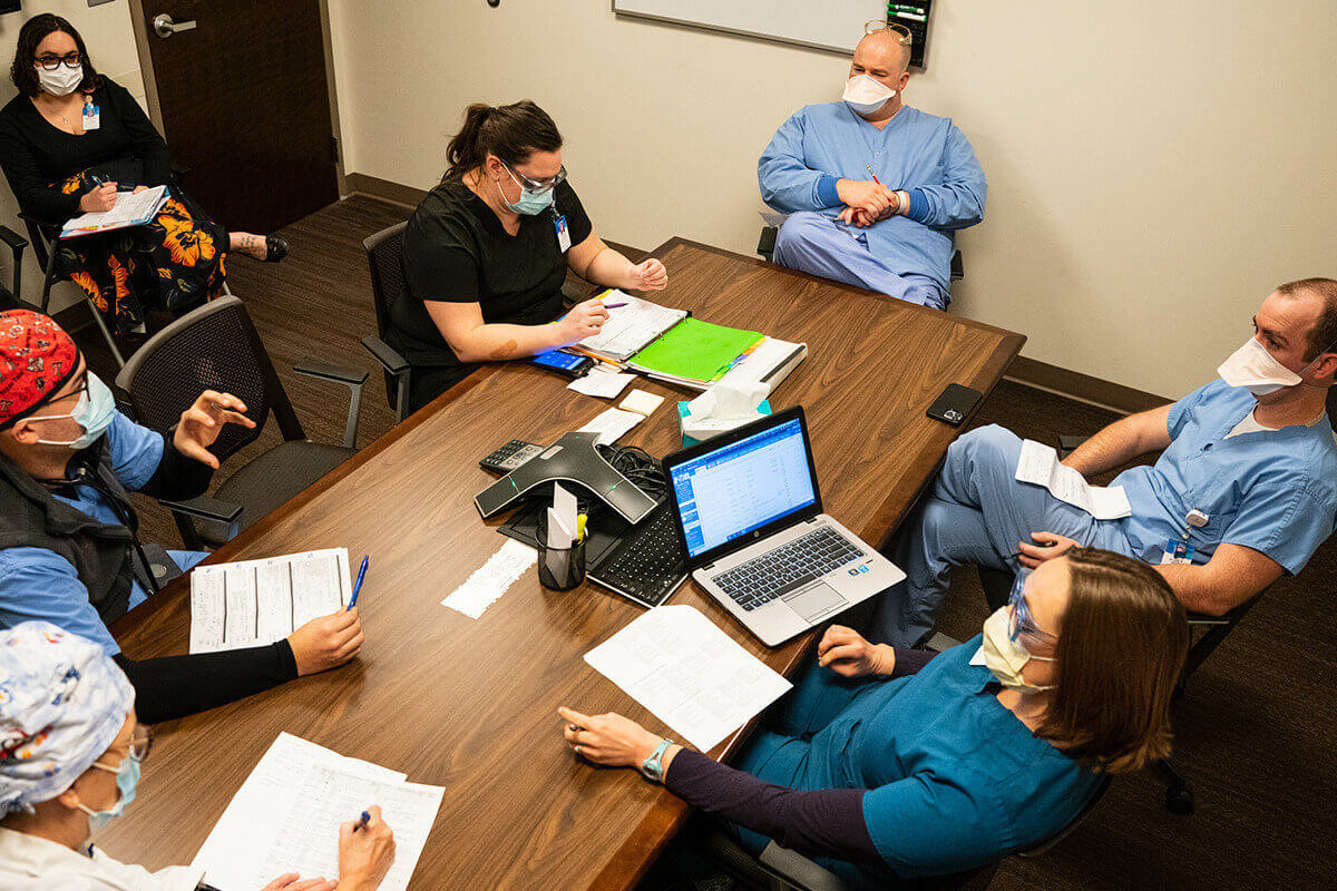 Photo of a care team meeting