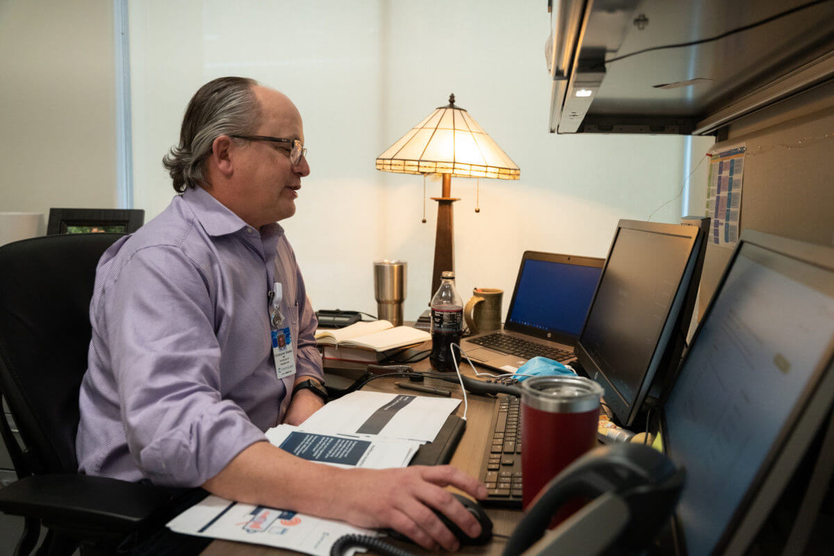 Photo of Chris Boelter MD at his desk