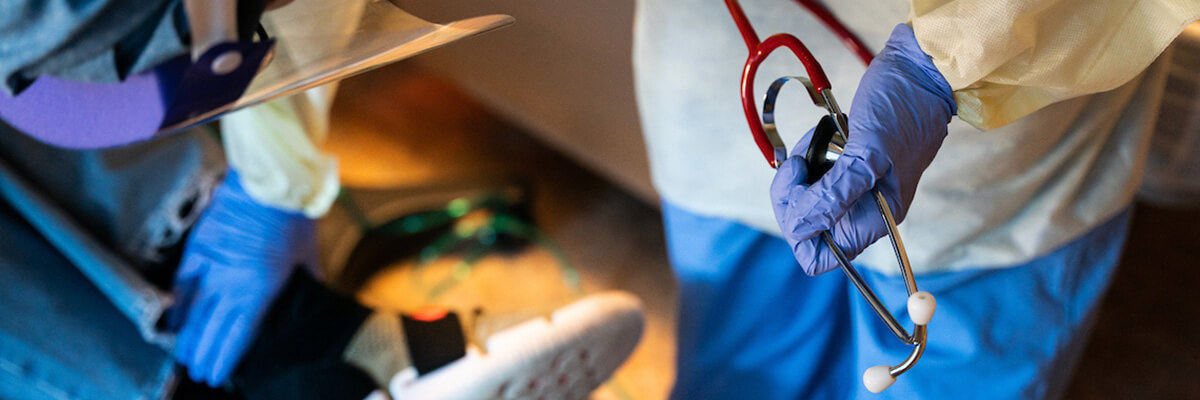 Photo of a CentraCare doctor examining a patient