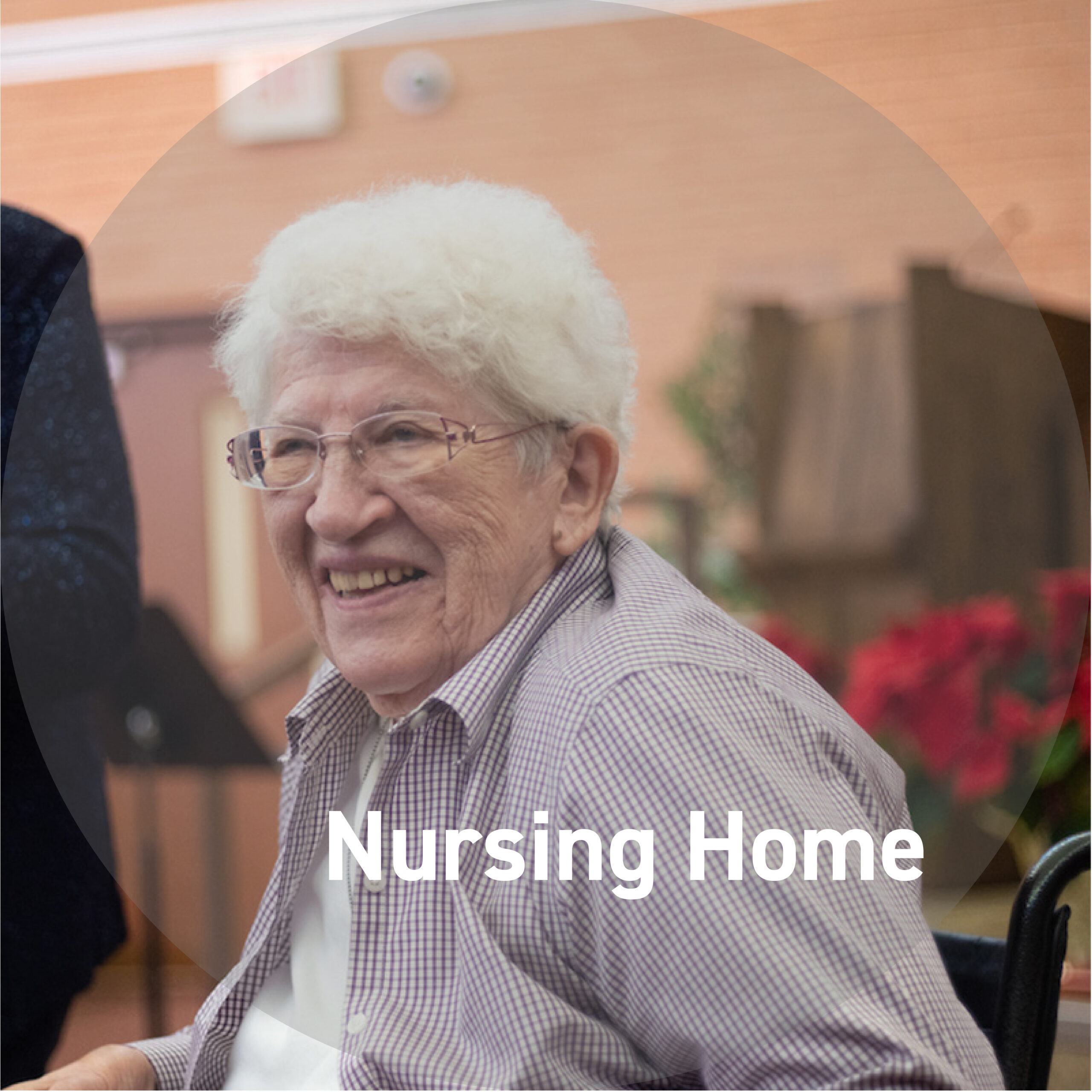 Photo of a smiling elderly woman in a nursing home