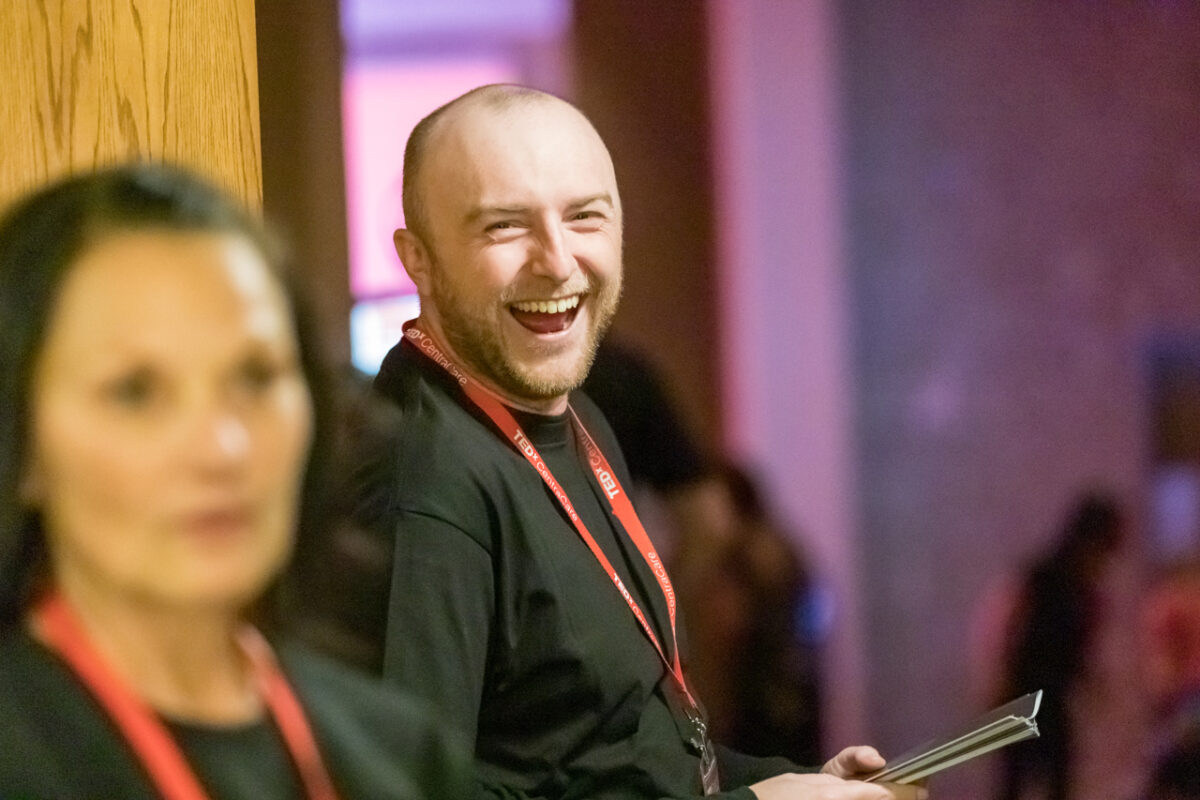 Happy greeting from a volunteer at TEDxCentraCare