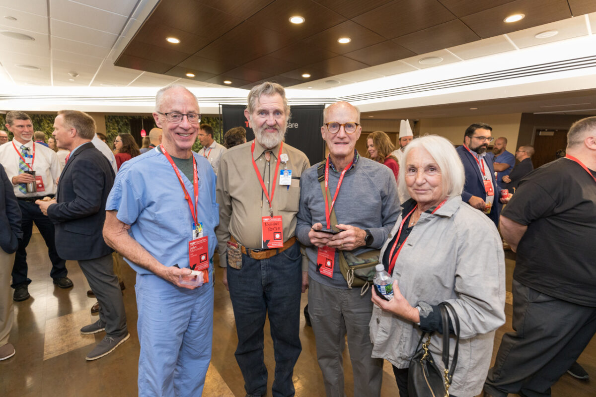 Colleagues gather for a photo at the TEDxCentraCare reception