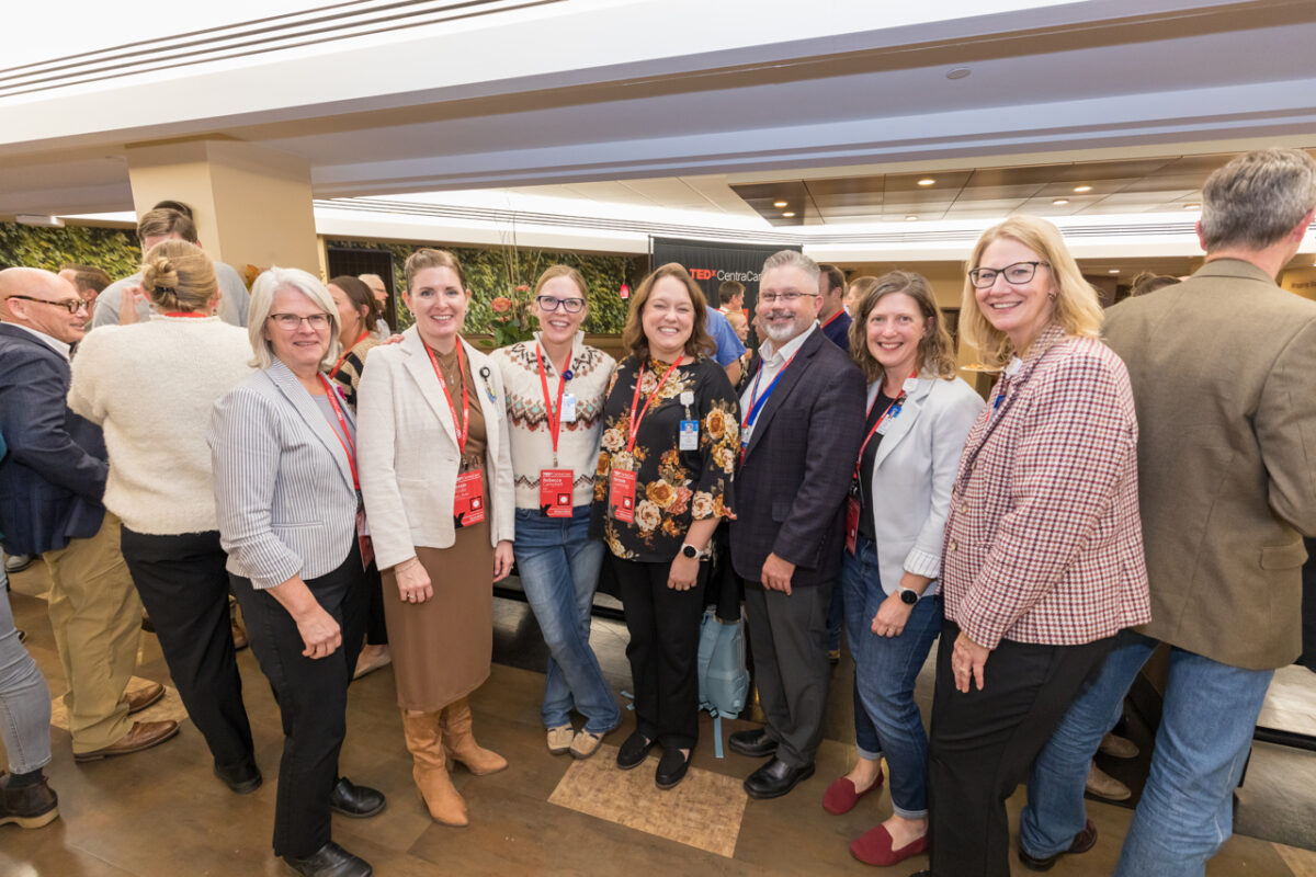 TEDxCentraCare speaker, Jessie Roske, MD, gathers with colleagues at the reception