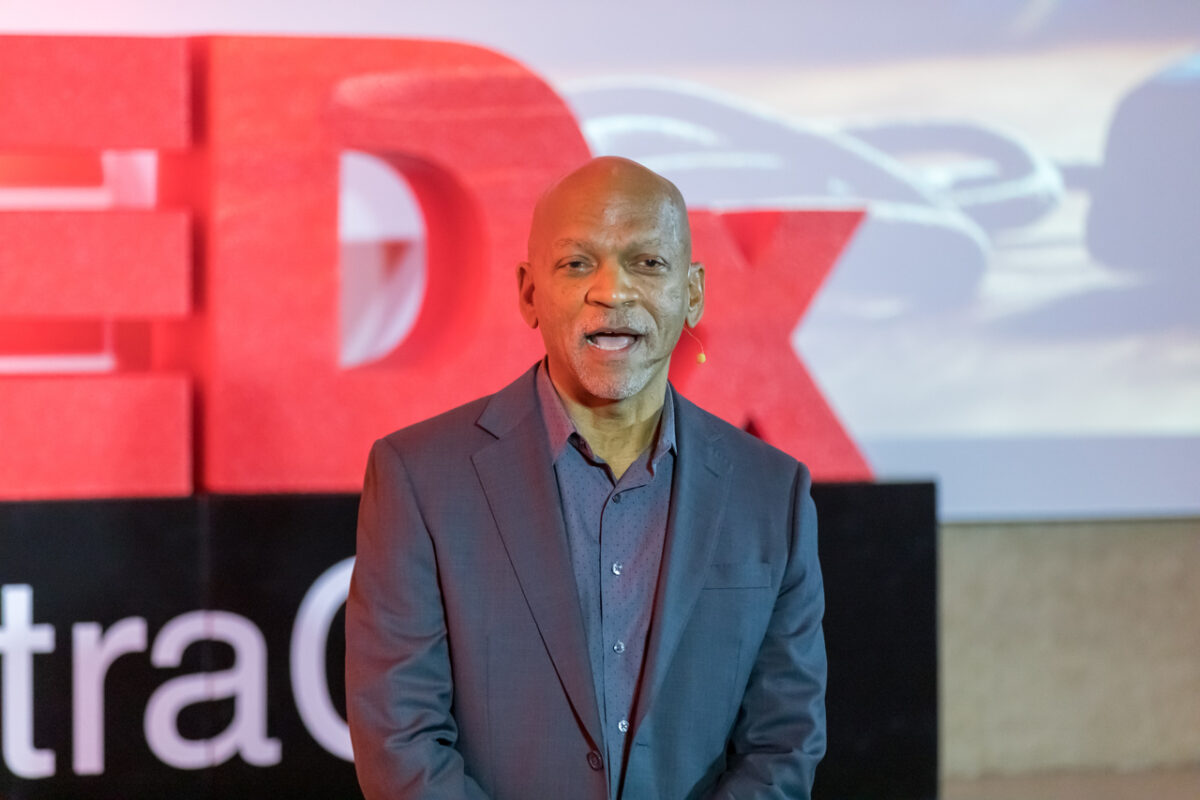 Photo of Jerone Kennedy, MD, on TEDxCentraCare stage