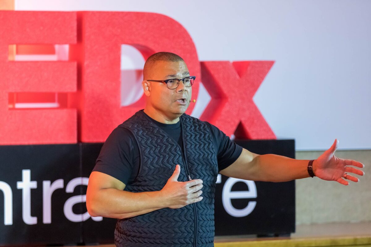 Photo of Chip Martin-Chaffee, MD, on the TEDxCentraCare stage