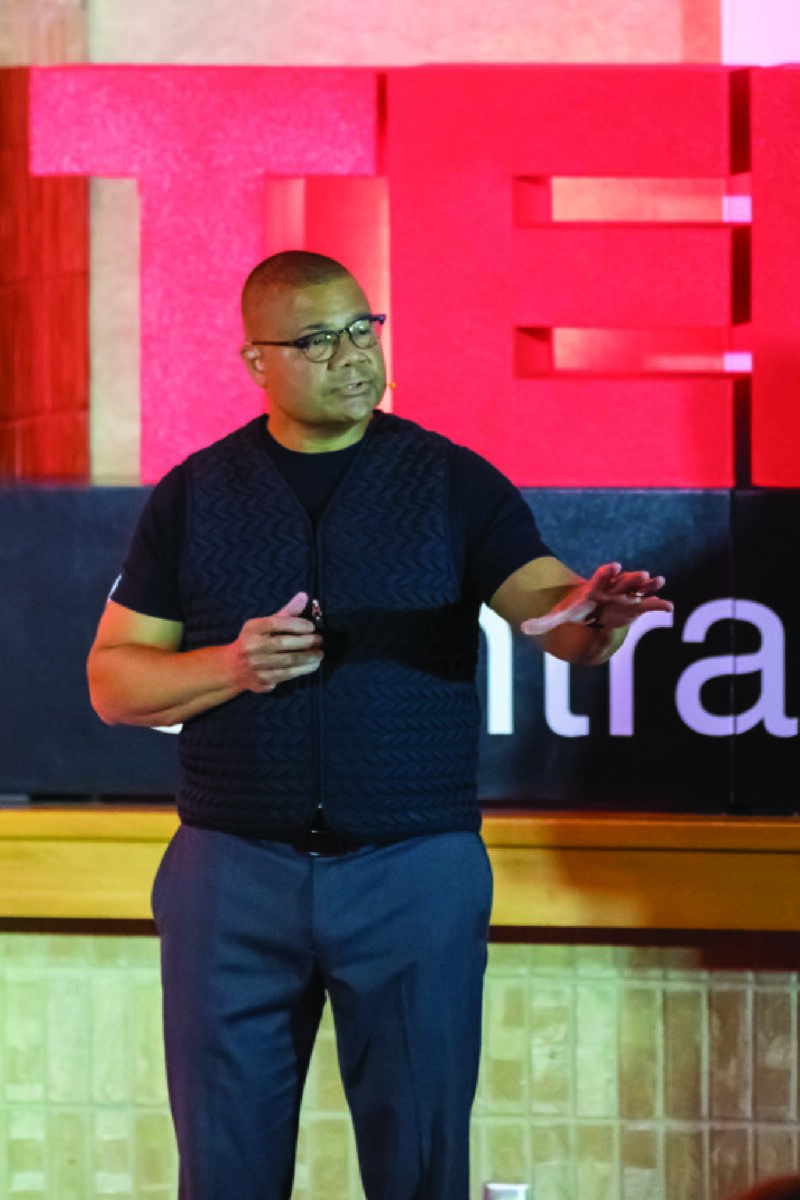 Photo of Chip Martin-Chaffey, MD, on TEDxCentraCare stage