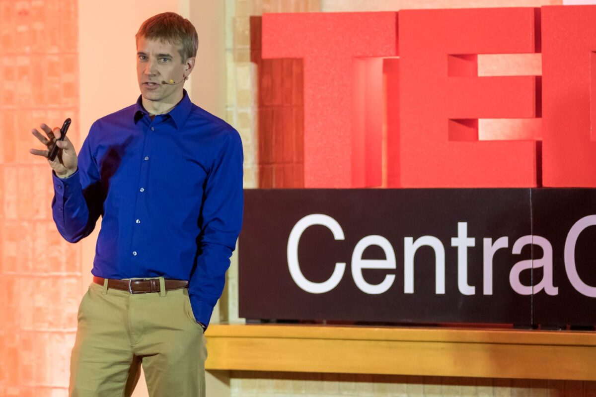 Photo of Chris Thompson, MD on the TEDxCentraCare stage