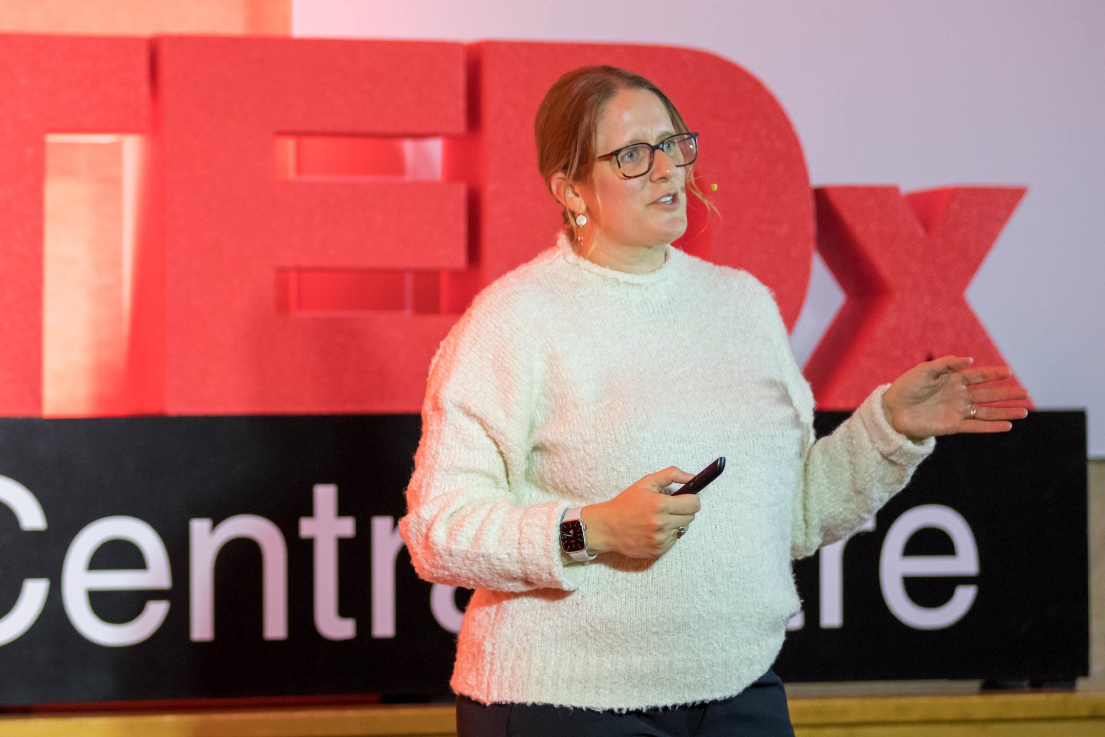 Photo of Jill Amsberry, DO, on the TEDxCentraCare stage