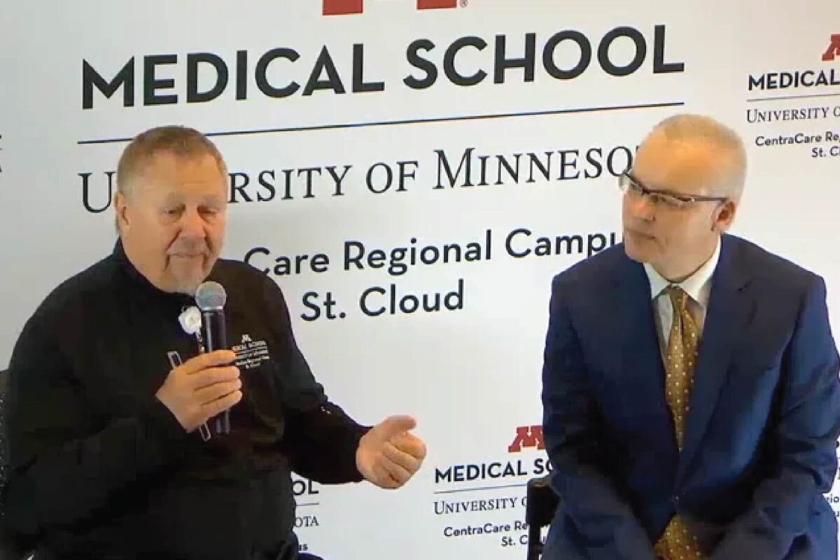 Photo of Ken Holmen, MD, CEO and President of CentraCare with Jakub Tolar, Dean of University of Minnesota Medical School